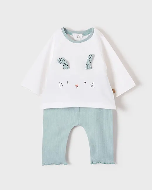 Completo in cotone stretch a pois composto da t-shirt con volant al fondo e leggins bianchi 4-12 mesi