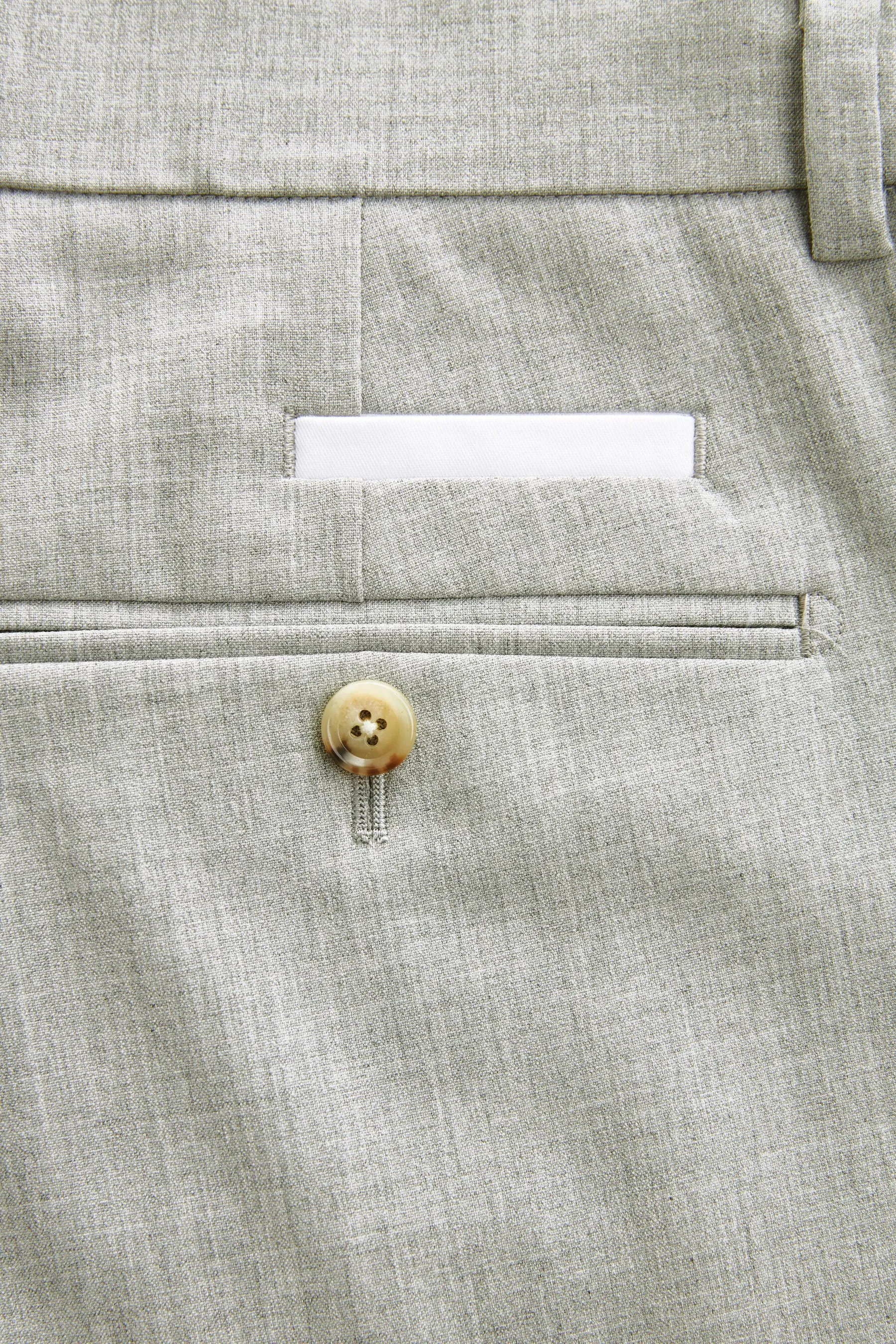 Completo skinny con bordi a contrasto: Pantaloni