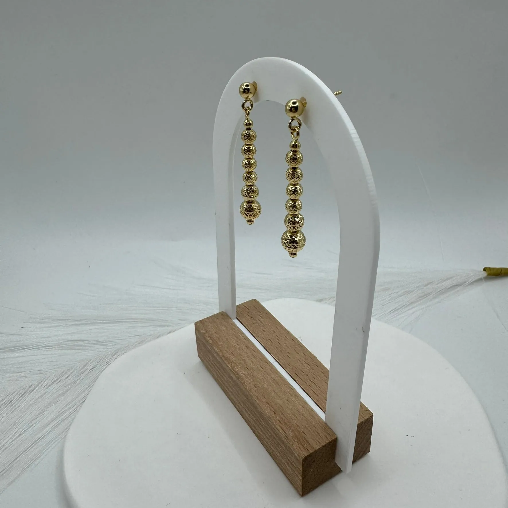Orecchini pendente sfere martellate oro