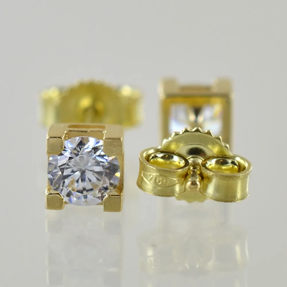 Orecchini Punto luce in oro giallo con zircone 4.20 mm