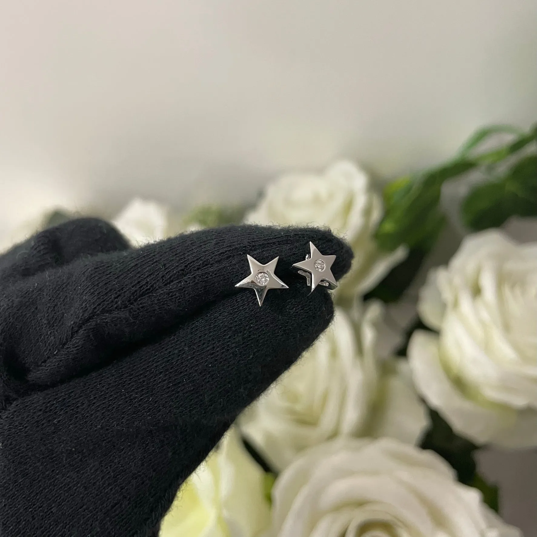 Orecchini stella punto luce oro e diamante