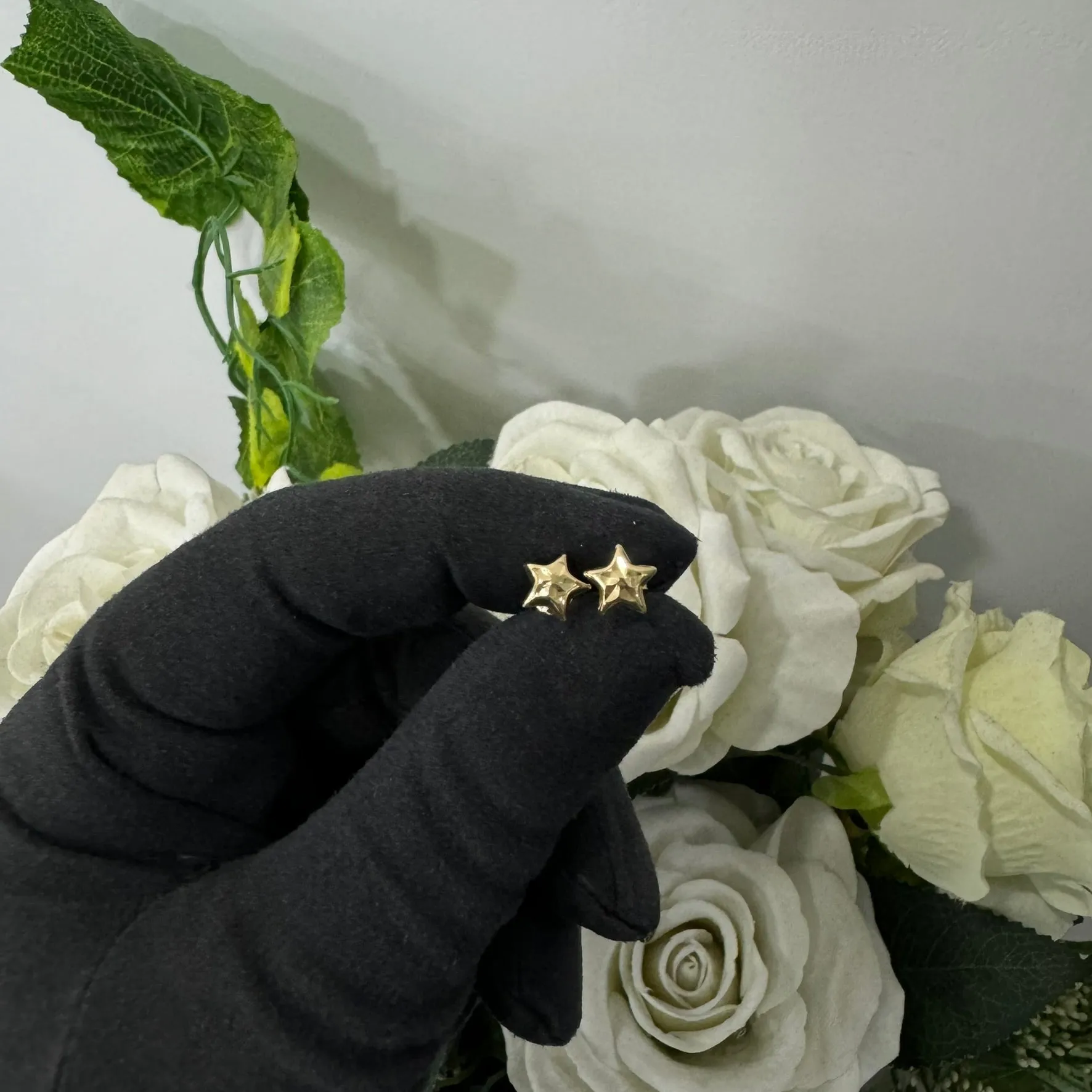 Orecchini stella sfaccettato oro