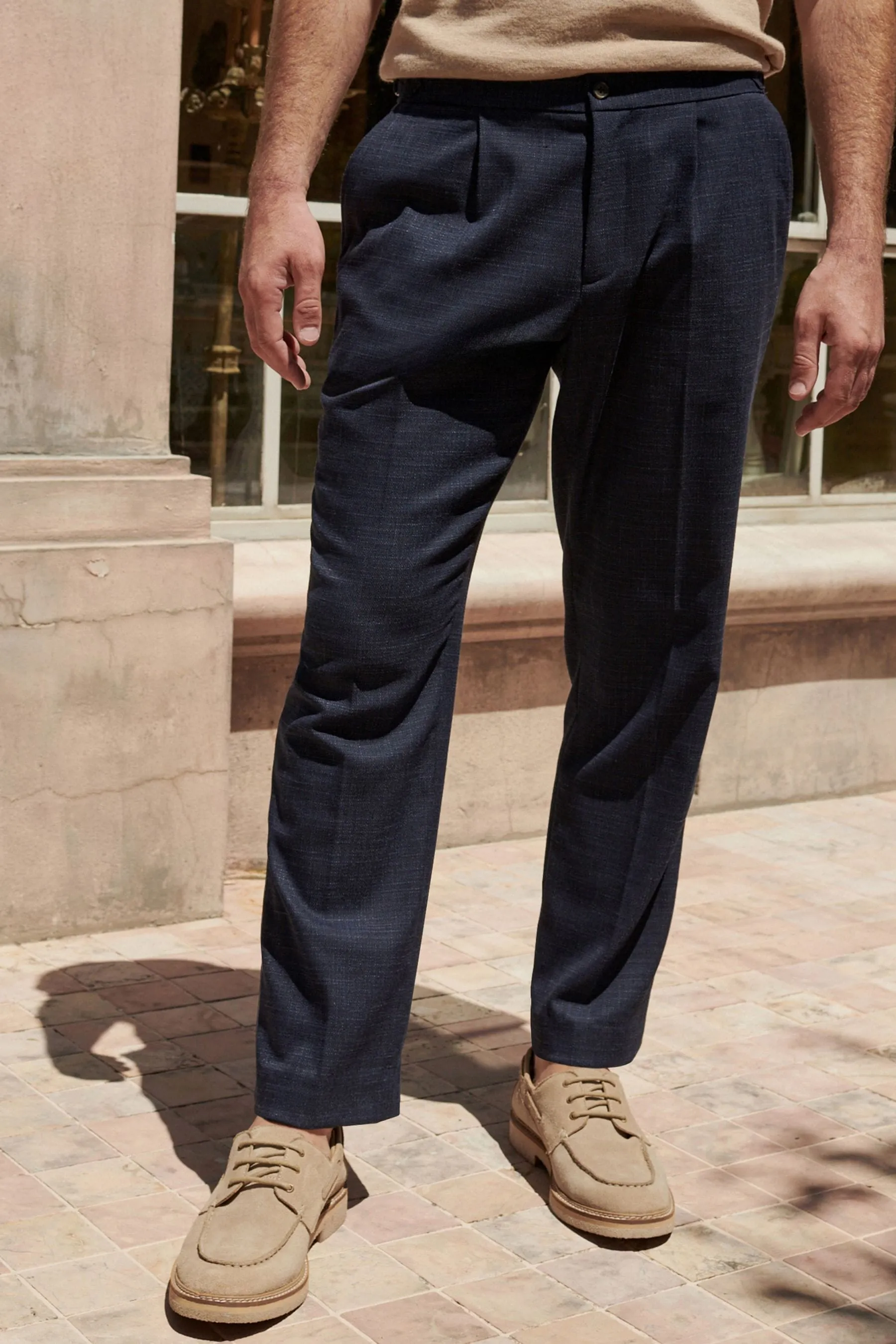 Pantaloni con regolabile laterale testurizzato