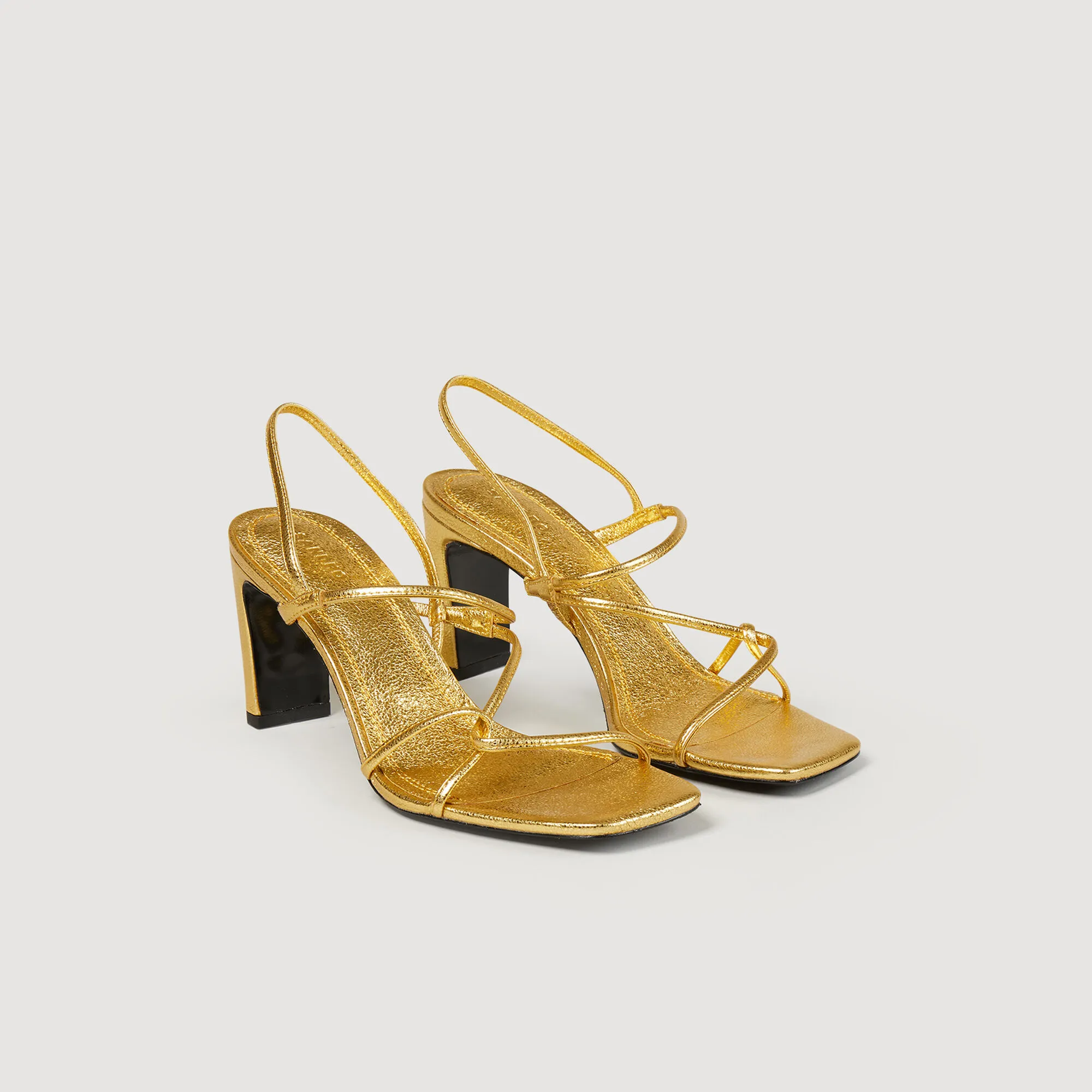 Sandali in pelle goffrata